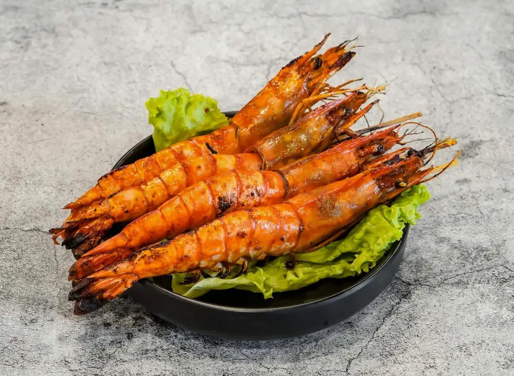 T&ocirc;m nướng bơ tỏi là linh h&ocirc;̀n của mọi bữa ti&ecirc;̣c